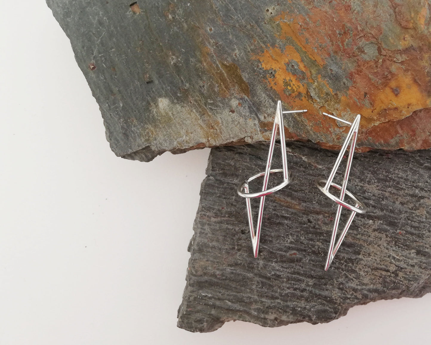 Silver geometric sculptural earrings by Inplico Design. Geometric Structure 1 handmade by Roz Adams